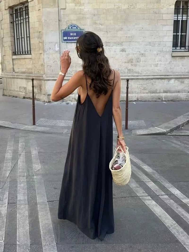 New Holiday Loose Fe Backless Black Dress 2024 Summer Women Fashion Temperament Casual Flowing Midi Suspender Long Dress XJ250814