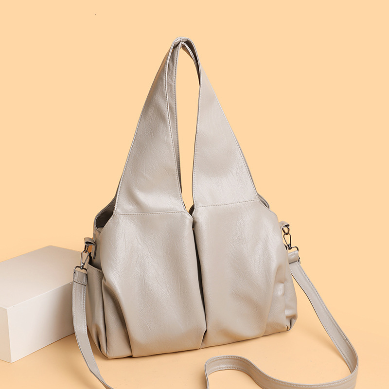 Women's crossbody bag 2025 designer's new fashionable simple retro solid color commuting shoulder bag