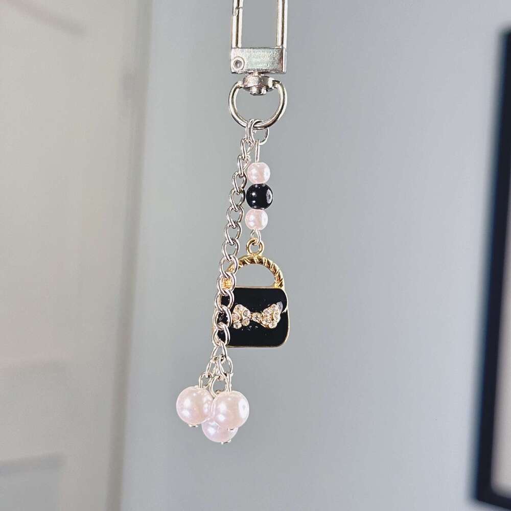 Bag Charms Designer Alloy Keychain charm Camellia small clothes for women Bag Pendant DIY Earphone Case Car Pendant