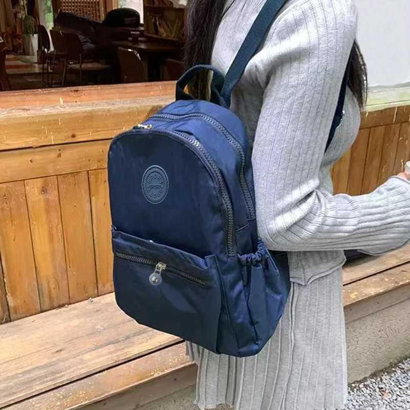 Mens and Womens Korean-style Fashionable Oxford Cloth Waterproof Nylon Fabric Casual Motorcycle BackpackXJ250814