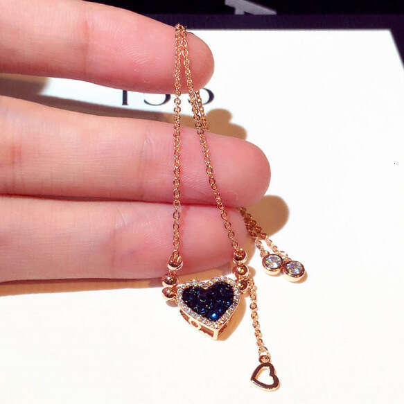 New Fashion Korean and Japanese Style with Blue Crystal Heart Pull Rope Elegant Bracelet Jewelry for Women S00301