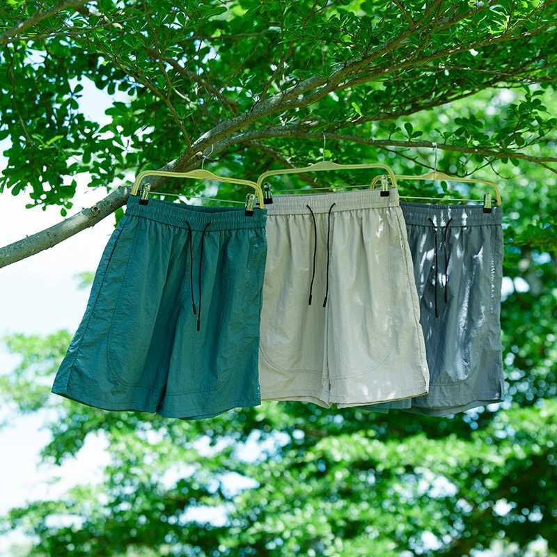 Ice silk waterproof quick drying shorts mens summer thin fit loose cycling running tennis versatile sports five quarter pants Y250814