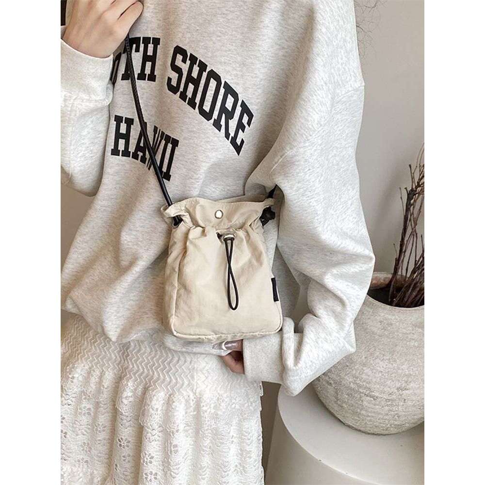 Crossbody women's fashion Oxford shoulder 2024 summer new walking mini phone small bag, cloth bag