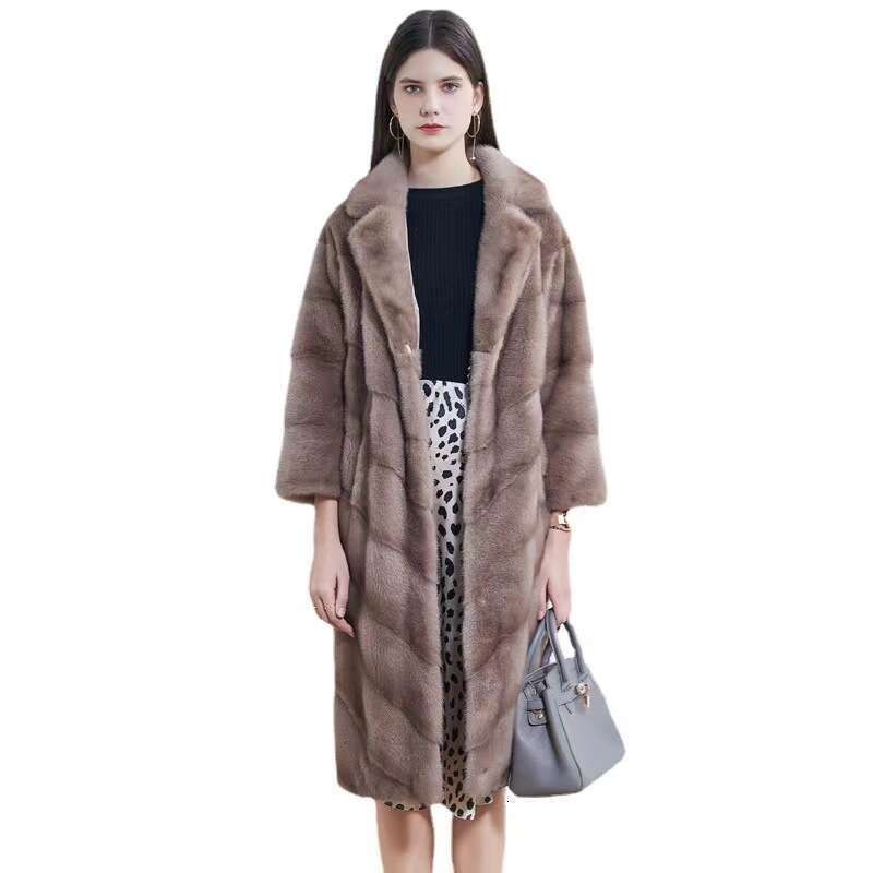 A full-length fur coat imitating mink fur for women, with a suit collar, is a versatile, light luxury, and fashionable lapel