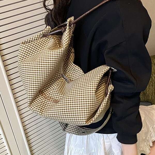 Bags Designer Women Korean Large Capacity Bucket for Women 2025 New Fashion Commuter Shoulder Versatile College Style Canvas Bag