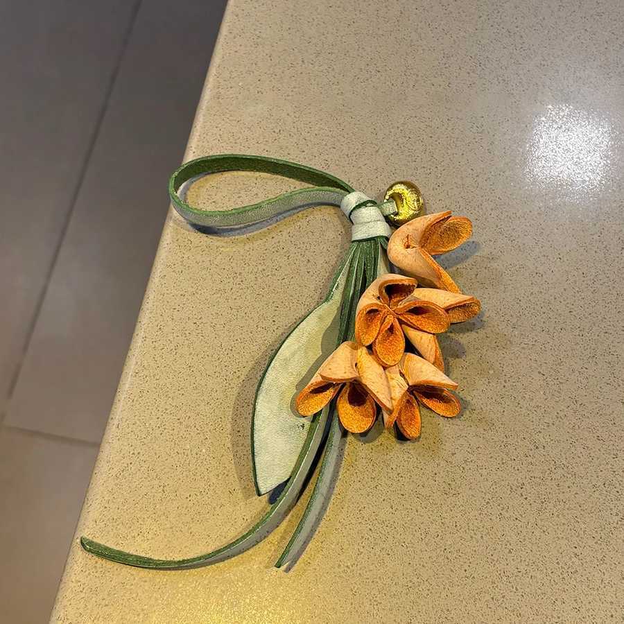Genuine Leather Flower Shaped Bag Charm Cowhide Rope Womens Tulip Bag Pendant Car Keychain Hand Rope Accessories Y250815