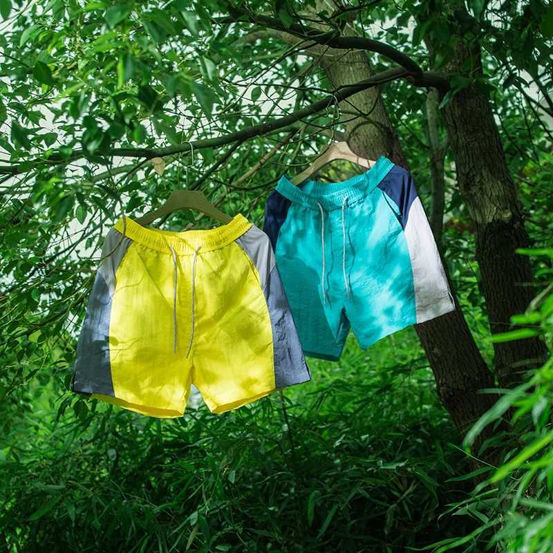 Sports running shorts mens trendy brand color blocking splicing drawstring elastic five quarter pants for men and women Y250814