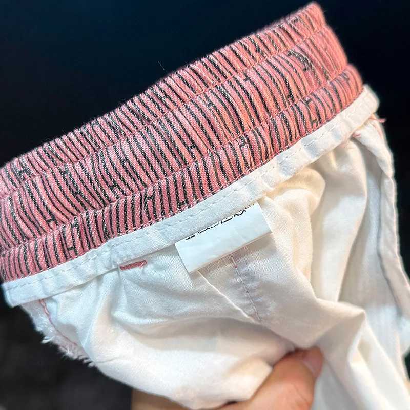 2025 Summer New Mens Beach Shorts Striped Printed Casual Trendy Sports Breathable Elastic Quarter Pants Y250814