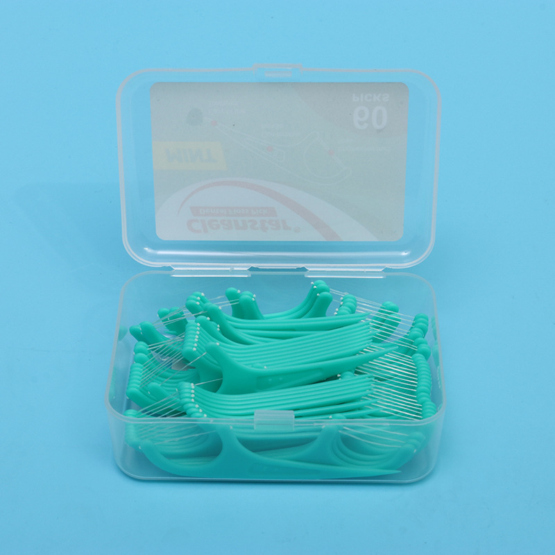 60-pack mint-flavored boxed dental floss sticks, dental floss picks, oral hygiene, interdental cleaning, plastic dental floss