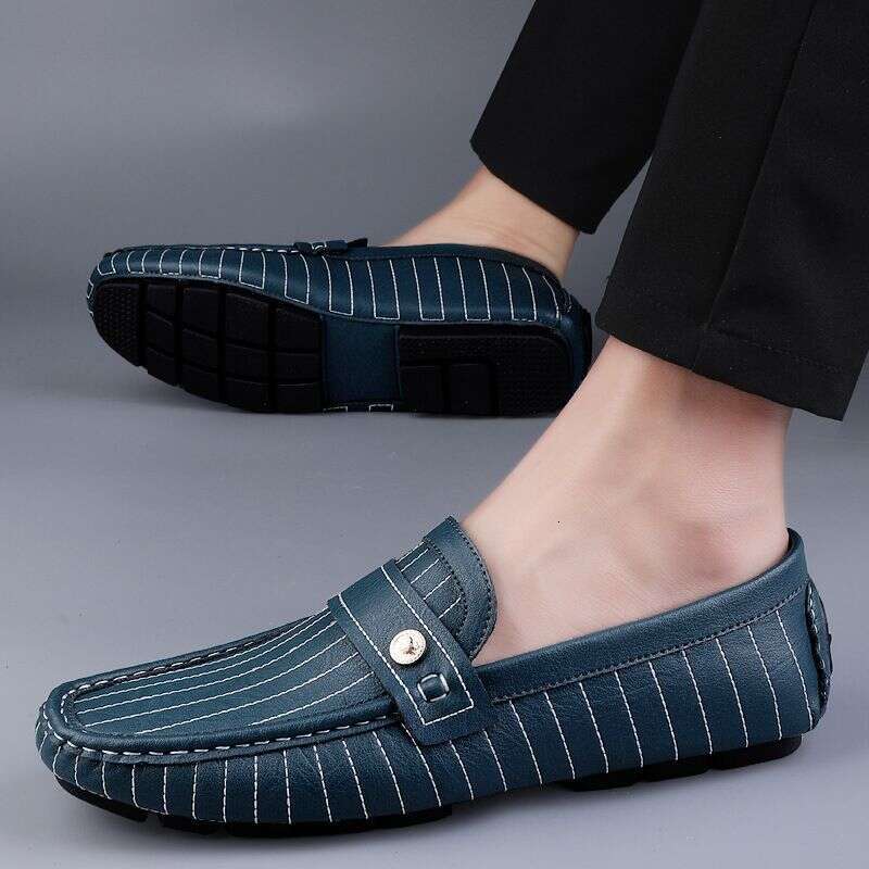 Foreign trade large size striped first layer cowhide moccasins men's European station British leisure fluorescent lazy one-step leather shoes