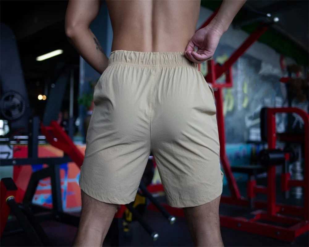 Mens Gym Fitness Shorts Bodybuilding running sports shorts Jogging Workout Male Summer Breathable Mesh Shorts men Sweatpants Y250814