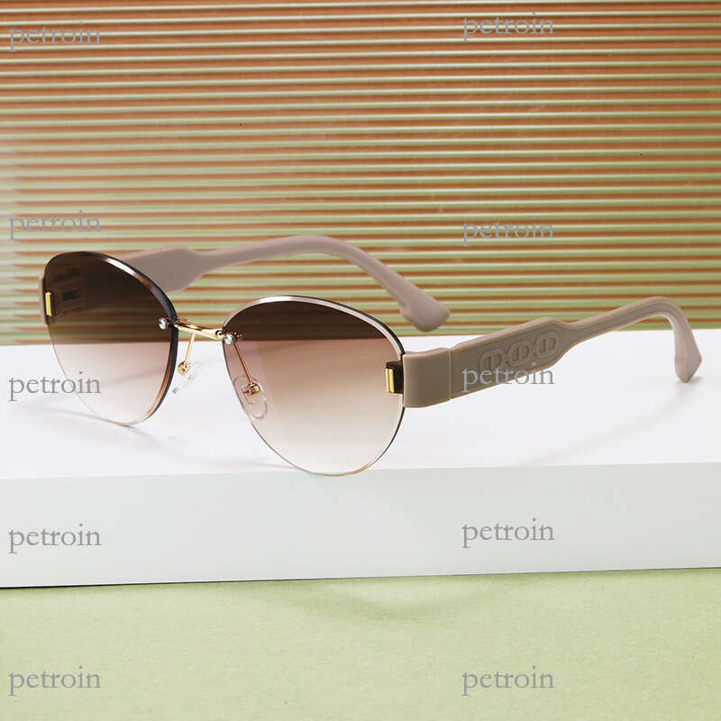 New Trendy Fashionable Unisex Oval Frameless Celebrity Runway High-end Sunglasses