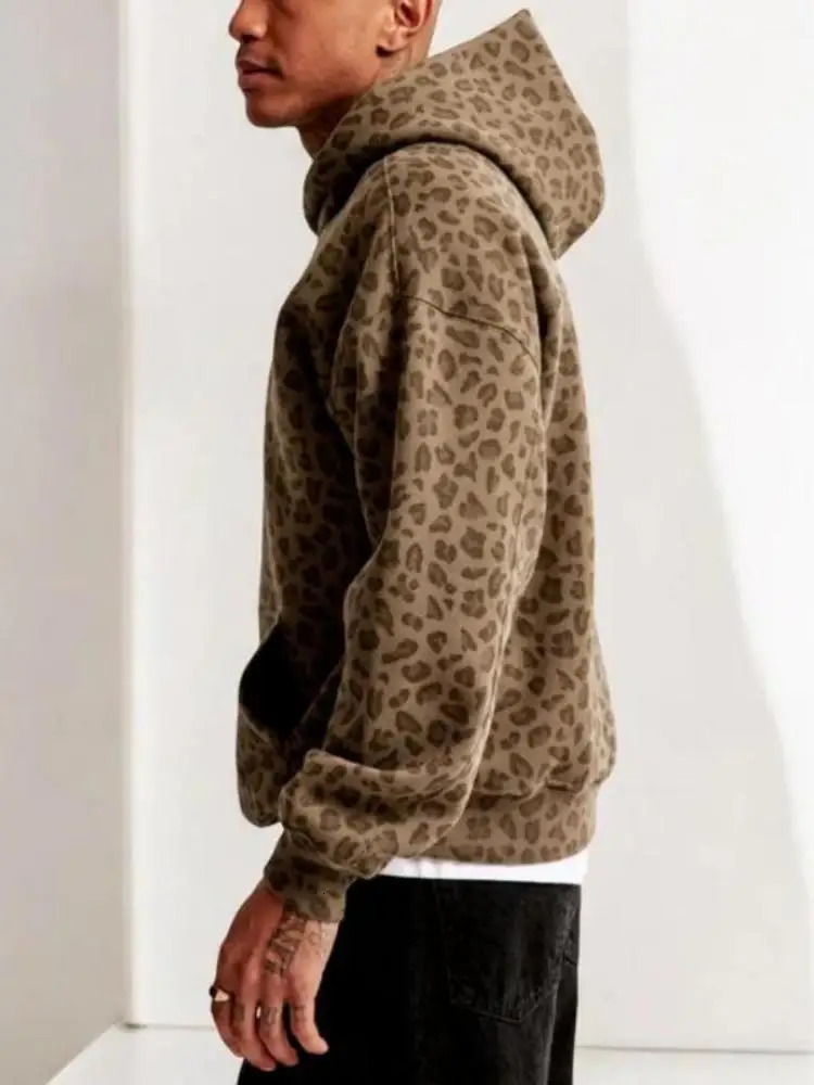 The autumn and winter leopard print hooded sweatshirt loose pullovers for men women tops 250814