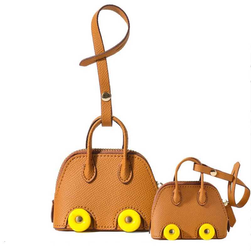 Mini PU Leather Wheeled Bag for Purses Car Keychain Lipstick Soft Storage Bag for Phones Cover New Fashion Y250815