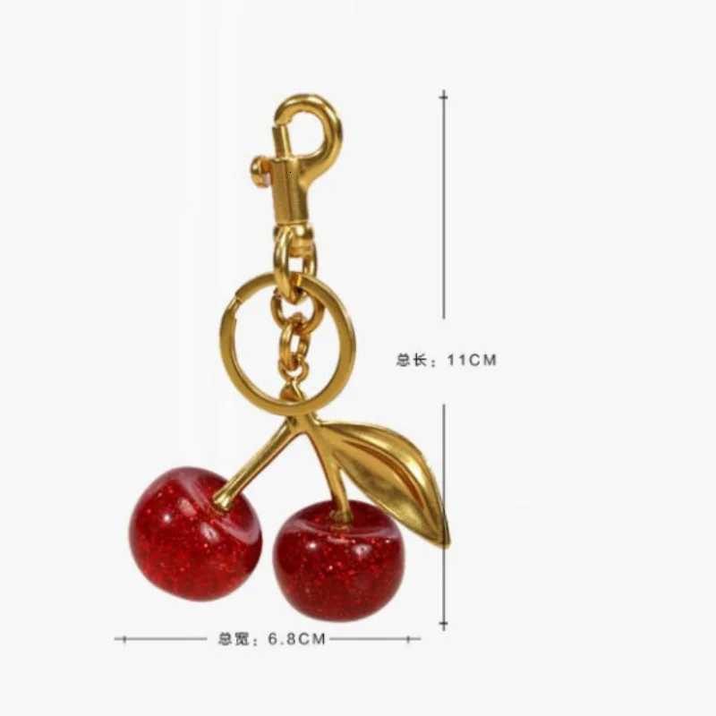 highquality largesize cherry keychain for womens bag pendant fashion black red pink green blue color car key charm s250815 mini bag keychain