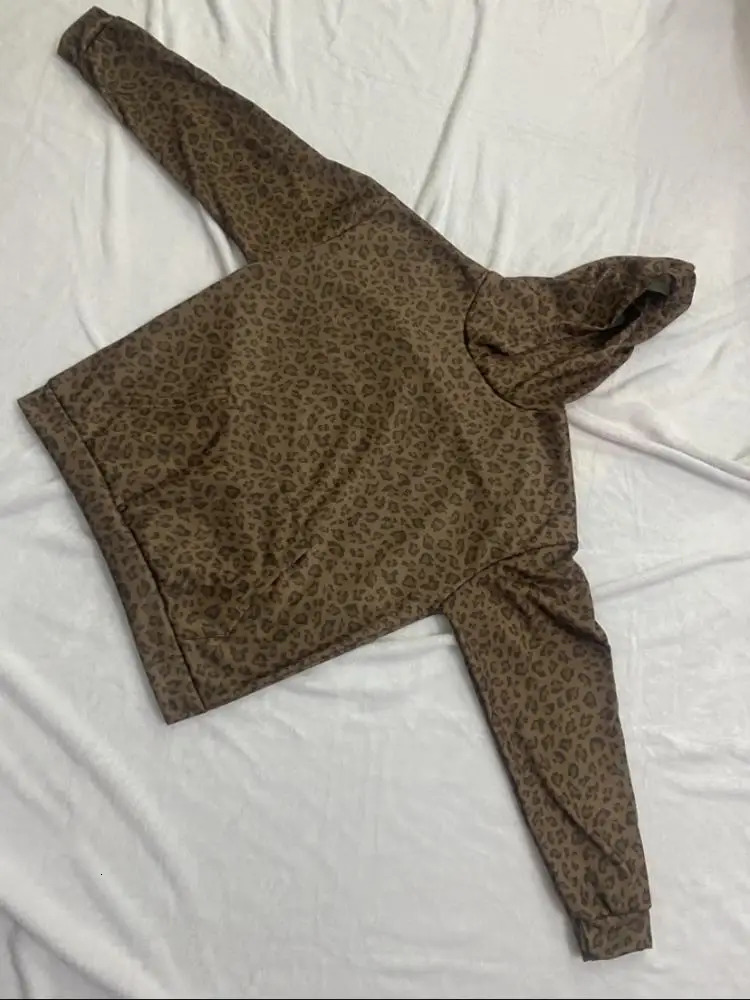 The autumn and winter leopard print hooded sweatshirt loose pullovers for men women tops 250814
