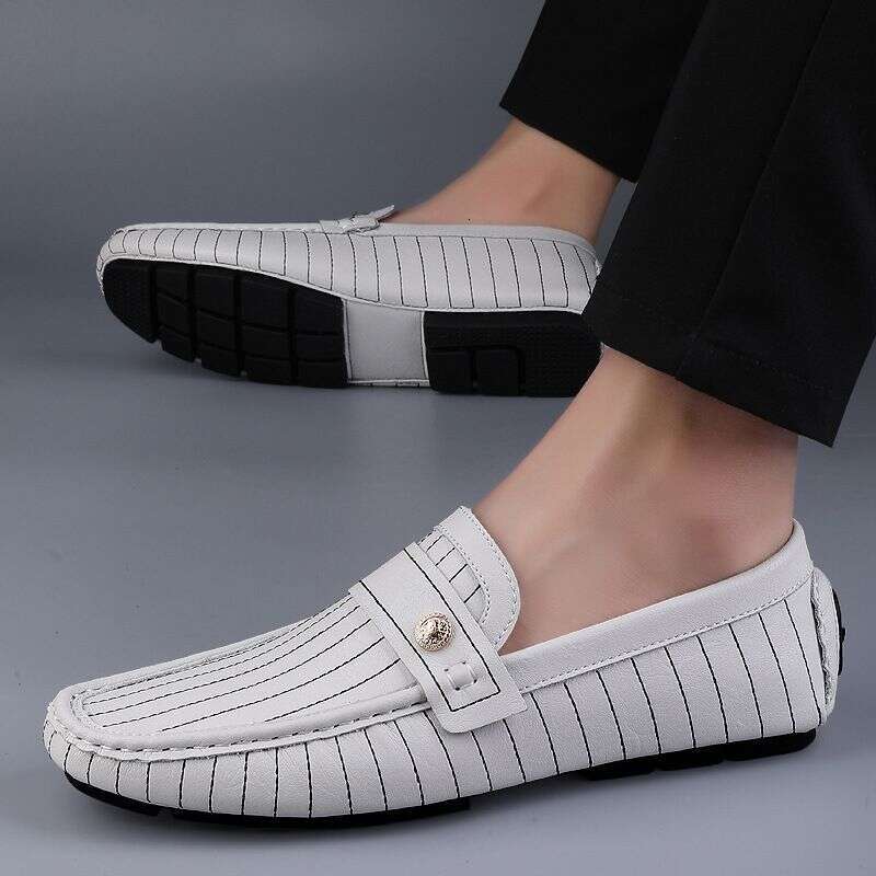 Foreign trade large size striped first layer cowhide moccasins men's European station British leisure fluorescent lazy one-step leather shoes