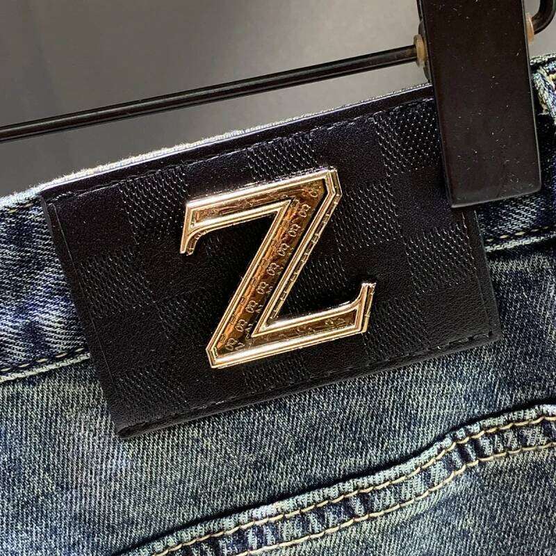 Spring and Autumn 2025 New Trendy Brand Splicing Patch Retro Jeans Men's Slim fit Small Feet Rascal Handsome Denim Pants