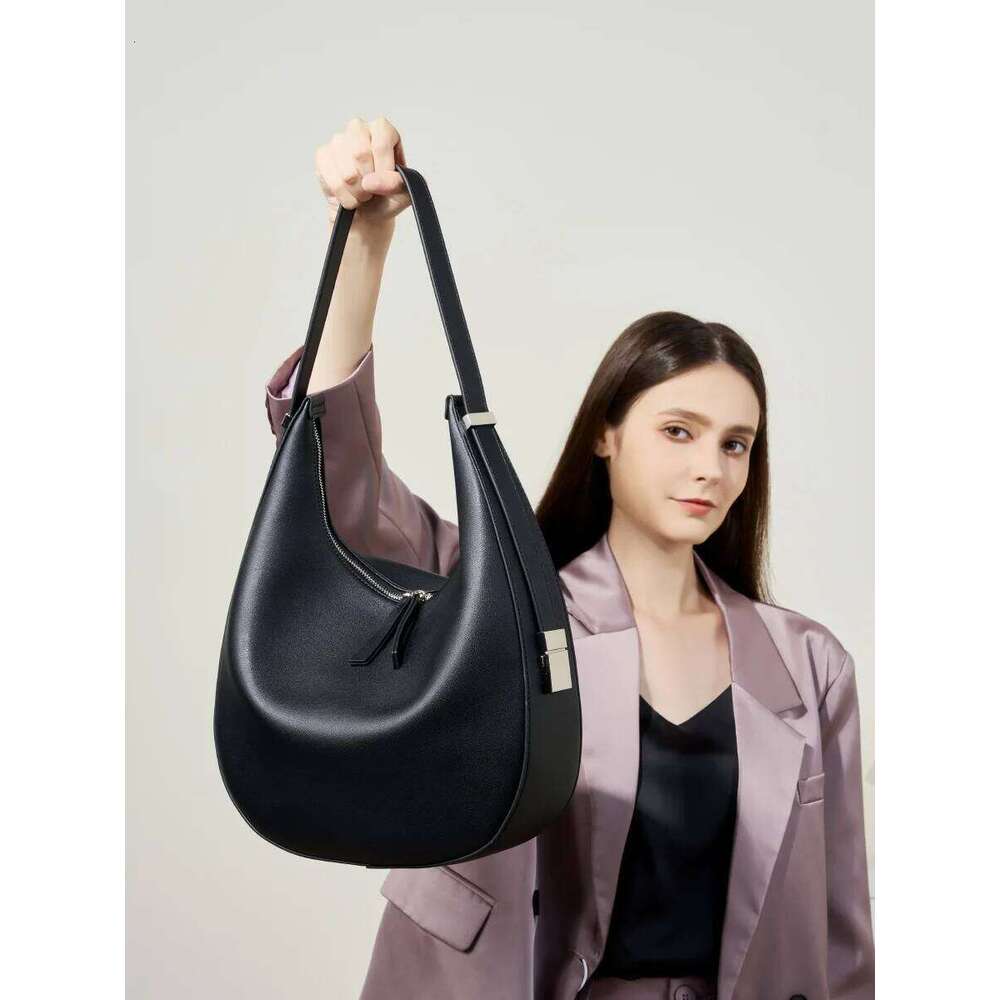 Designer Bags 2025 Spring/Summer New Niche Design Cowhide Underarm Shoulder Hand-Held Leather Crescent Bucket Women's Bag Luxury Bag