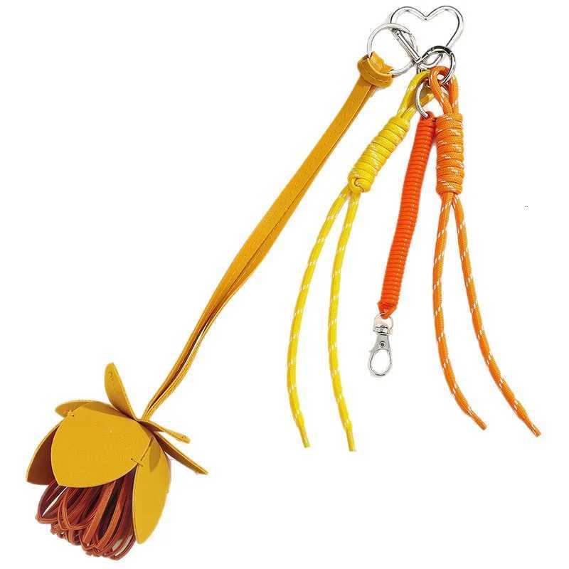 New Leather Wer Keychain Fashion Hanging Ornaments Lanyard Bag Accessories For Women Cute Bag Charm Pendant With Braided Rope Y250815