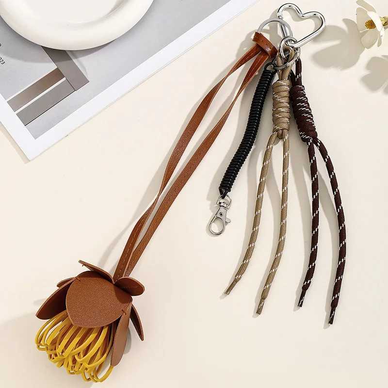 New Leather Wer Keychain Fashion Hanging Ornaments Lanyard Bag Accessories For Women Cute Bag Charm Pendant With Braided Rope Y250815