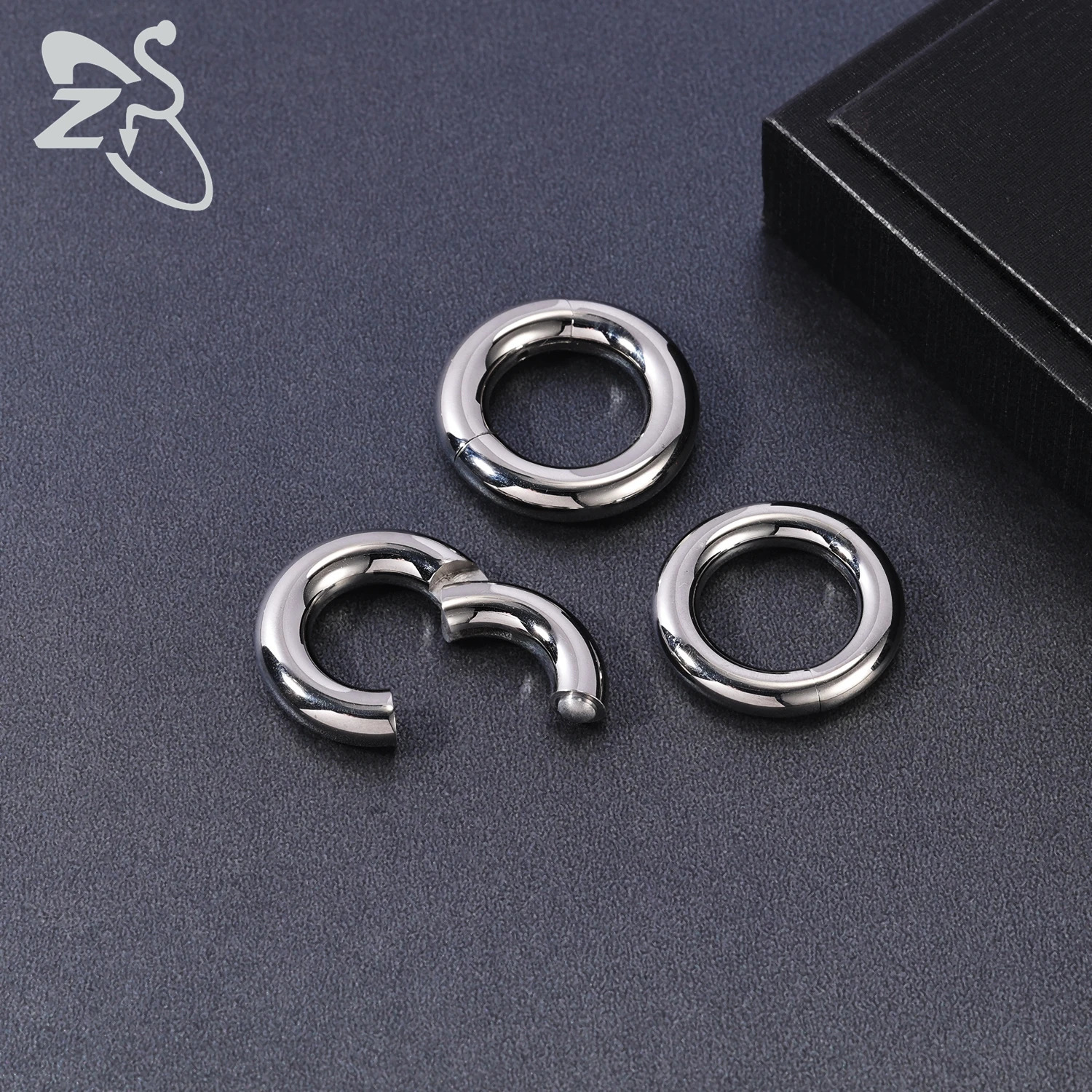 ZS 1 PC 2/4/6/8/10/12G Round F136 G23 Steel Nose Ring Men Women Large Gauge Piercings Nose Ear Expander Septum Piercing 250807