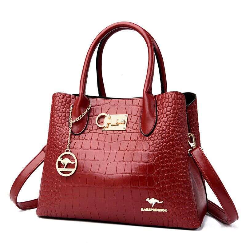 Crocodile print 2023 new one-shoulder cross-body hand-held middle-aged mom counter women's bag