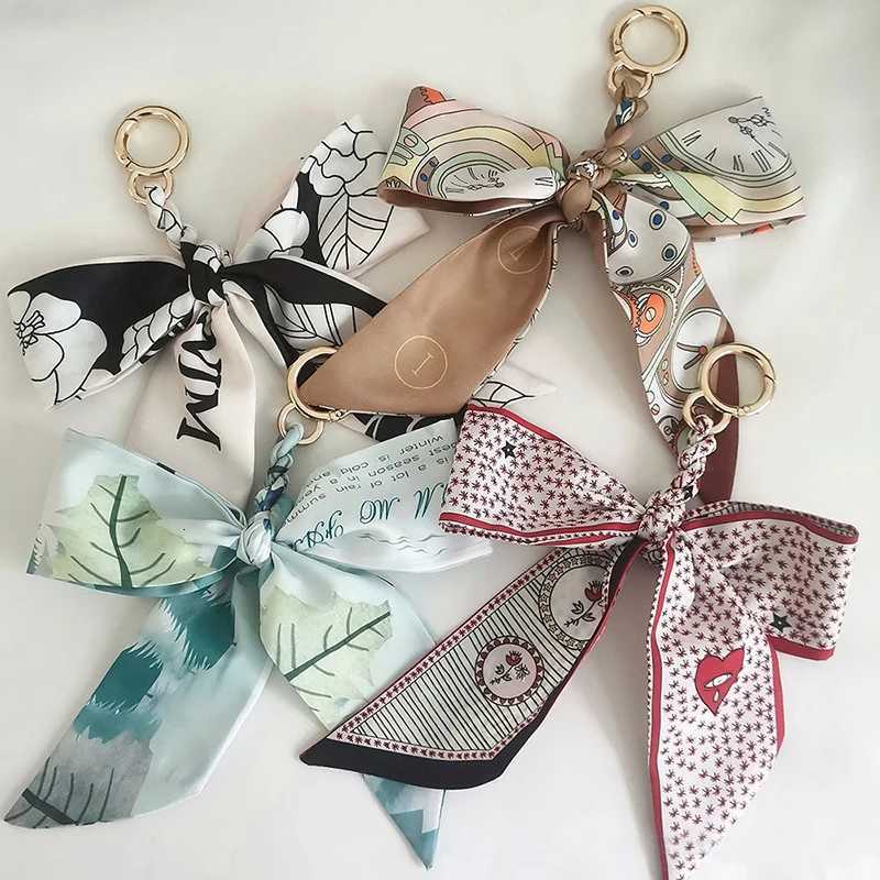 Camellia Silk Scarf Keychain for Women Woven Knot Pendant Girls Bag Ribbon Bowknot Pendants Car Key Chain Handbag Key Ring Gifts Y250815