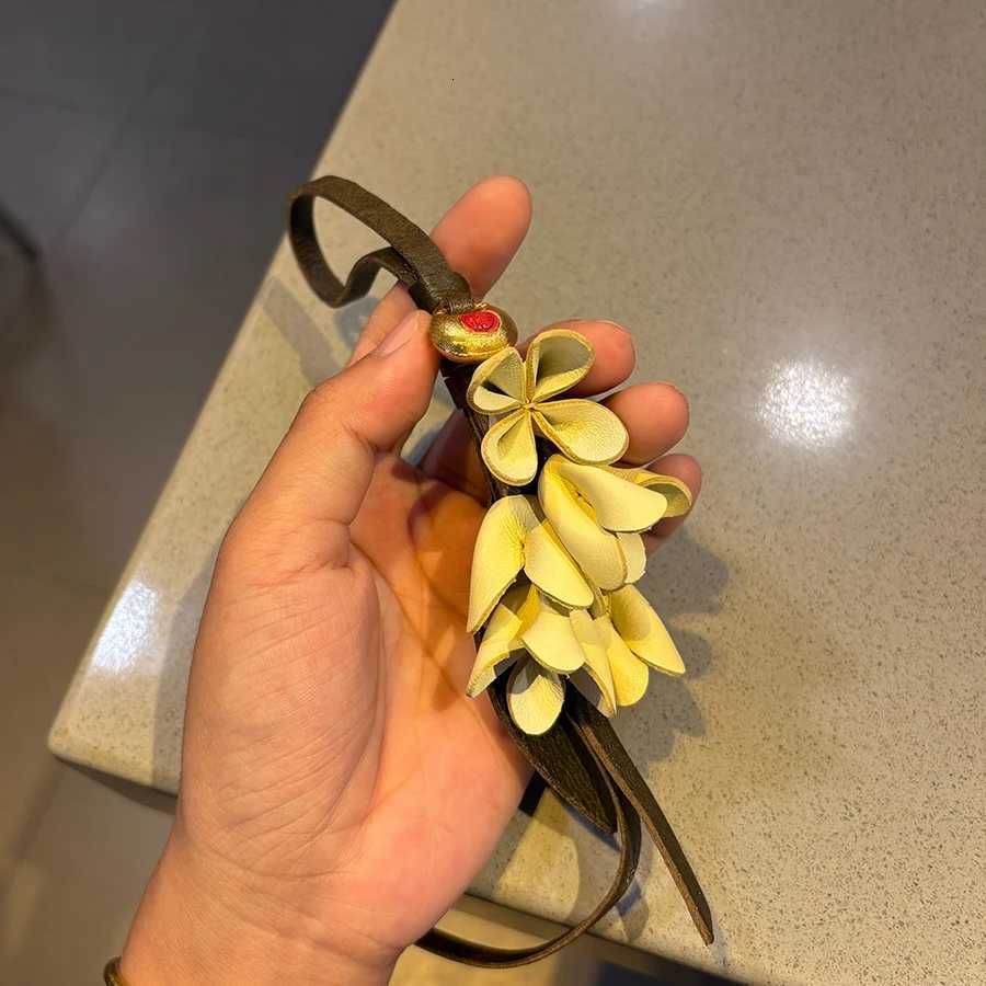 Genuine Leather Flower Shaped Bag Charm Cowhide Rope Womens Tulip Bag Pendant Car Keychain Hand Rope Accessories Y250815