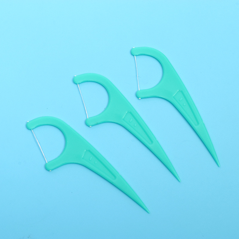 36-piece bag of premium portable dental floss sticks that are gentle on gums, suitable for hotels and home use, with bow-shaped floss picks