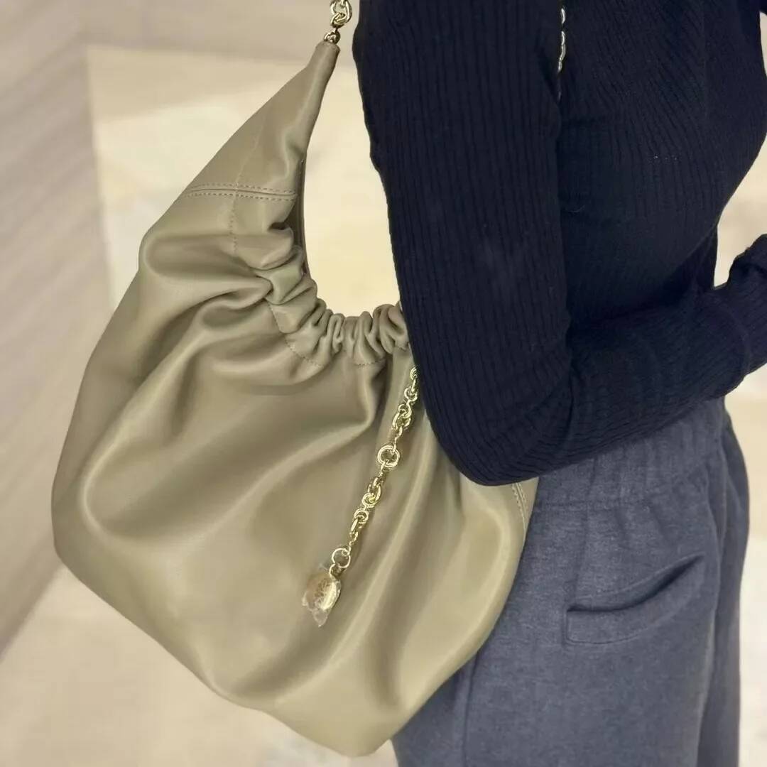 2024 New Squeeze Garbage Soft Cow Leather Elegant Cloud Pattern Single Shoulder Chain Underarm Bag From China Mainland