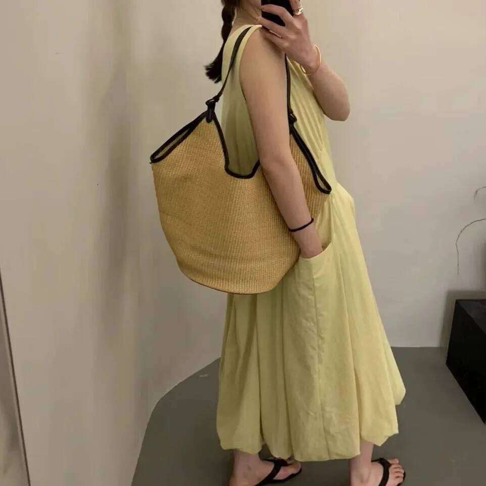 Lafite splicing head layer cowhide woven new niche design fashion summer vacation beach women underarm shoulder bag