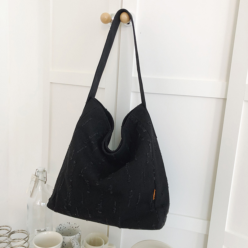 Autumn New Women's Shoulder Bag Denim Canvas Bag Shoulder Bag Design Sense Niche Commuting Large Capacity Handbag Bag Autumn New Designer Bag