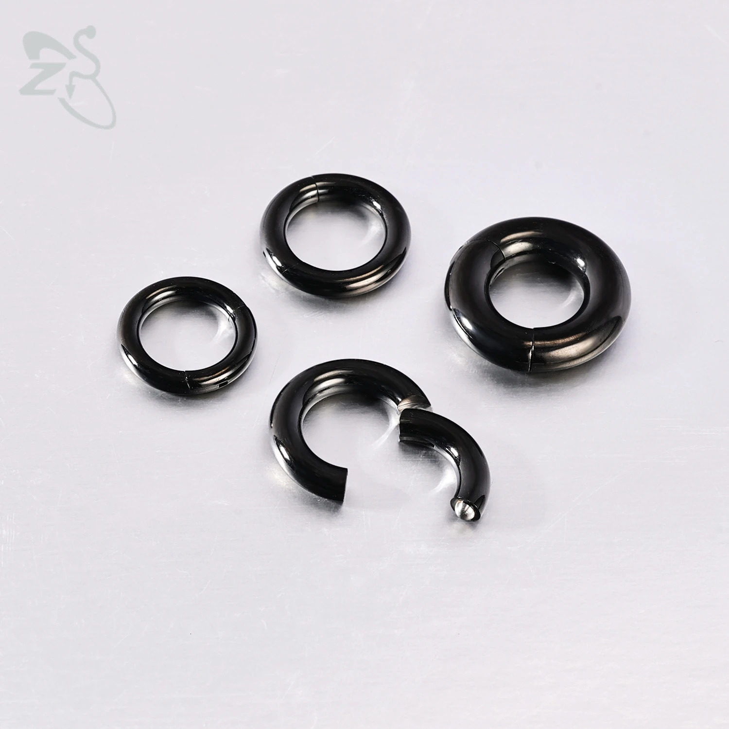 ZS 1 PC 2/4/6/8/10/12G Round F136 G23 Steel Nose Ring Men Women Large Gauge Piercings Nose Ear Expander Septum Piercing 250807