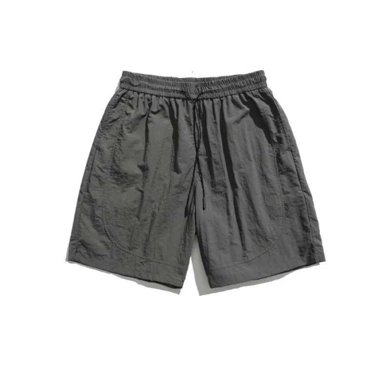 Ice silk waterproof quick drying shorts mens summer thin fit loose cycling running tennis versatile sports five quarter pants Y250814