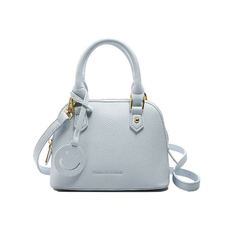 Trendy temperament solid color hand-held shell 2024 new high-end multi-color single shoulder crossbody women's bag