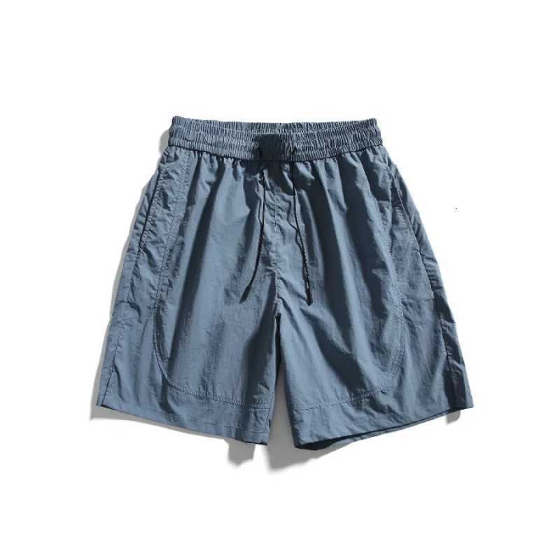 Ice silk waterproof quick drying shorts mens summer thin fit loose cycling running tennis versatile sports five quarter pants Y250814