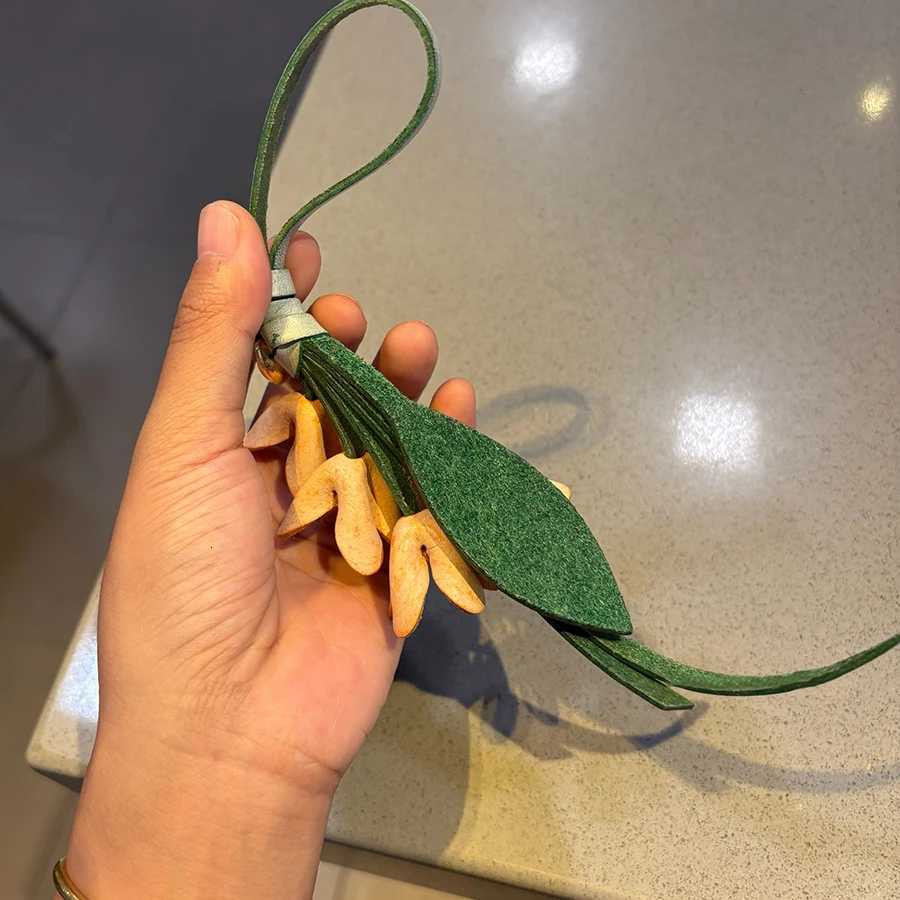 Genuine Leather Flower Shaped Bag Charm Cowhide Rope Womens Tulip Bag Pendant Car Keychain Hand Rope Accessories Y250815