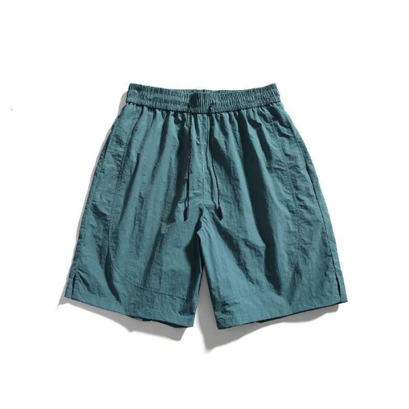 Ice silk waterproof quick drying shorts mens summer thin fit loose cycling running tennis versatile sports five quarter pants Y250814