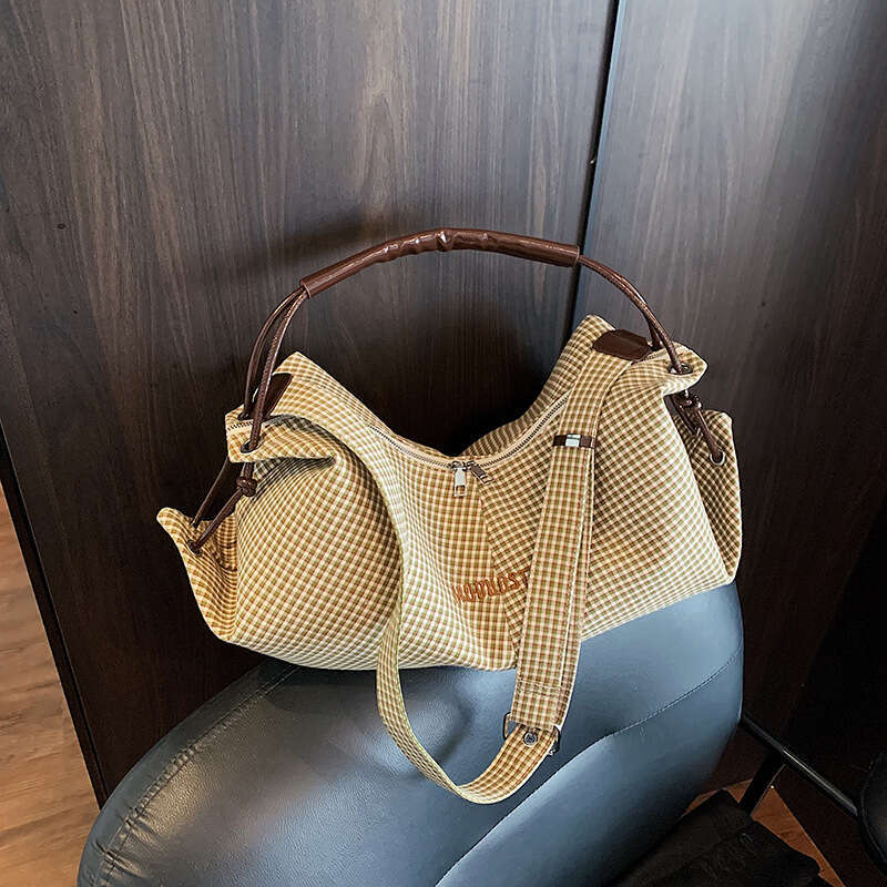 Bags Designer Women Korean Large Capacity Bucket for Women 2025 New Fashion Commuter Shoulder Versatile College Style Canvas Bag