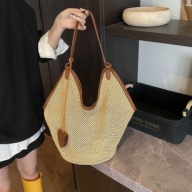 Lafite splicing head layer cowhide woven new niche design fashion summer vacation beach women underarm shoulder bag
