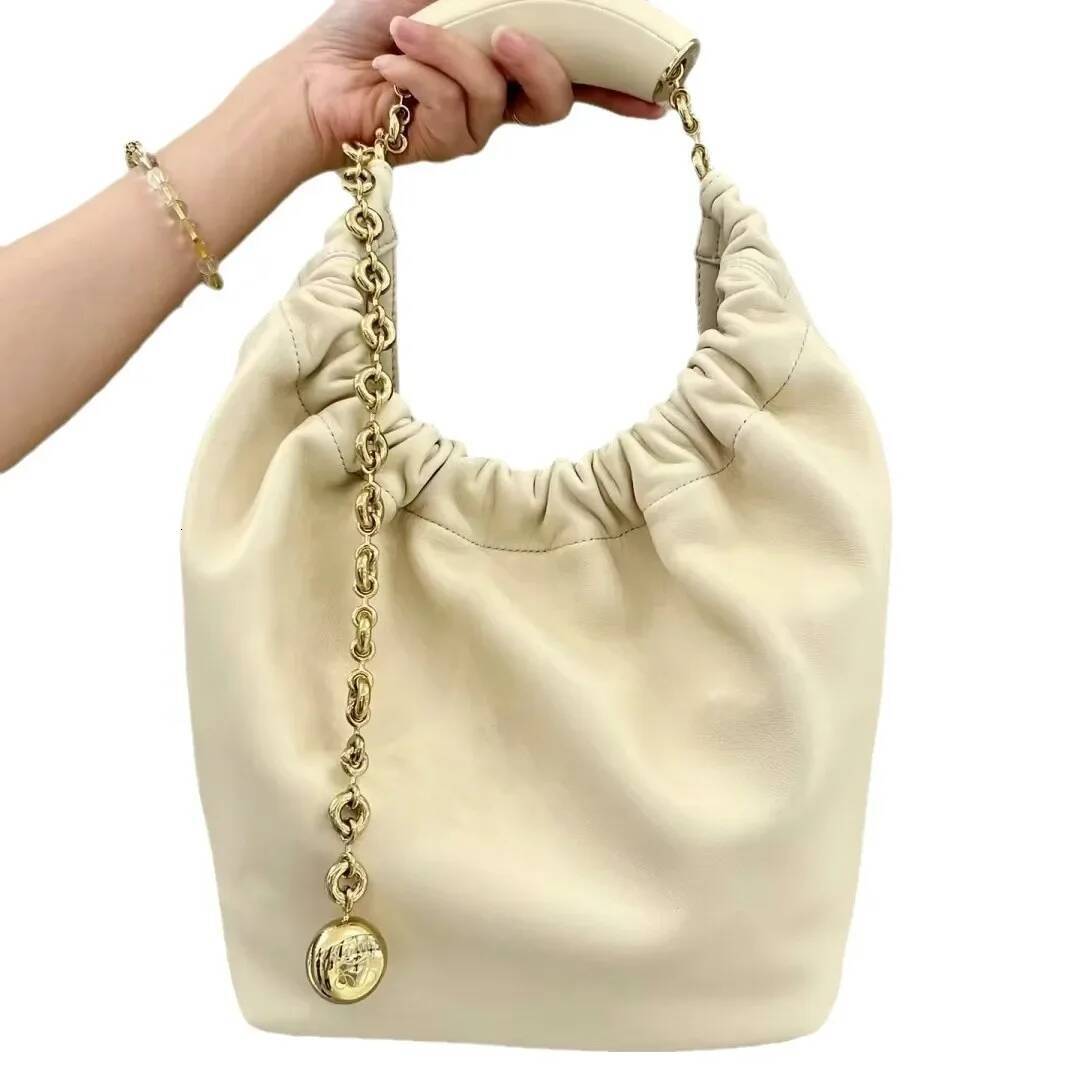 2024 New Squeeze Garbage Soft Cow Leather Elegant Cloud Pattern Single Shoulder Chain Underarm Bag From China Mainland