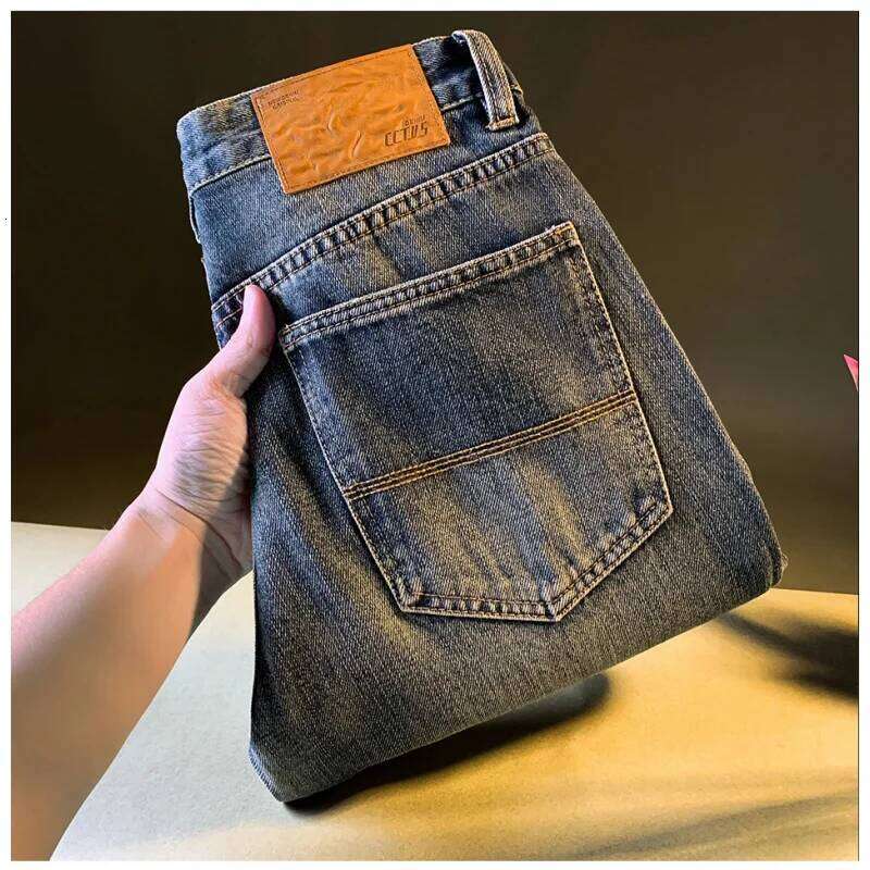 High end retro washed denim jeans for men in autumn 2025, new men's clothing Korean version straight tube loose and soft pants