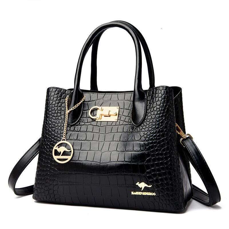 Crocodile print 2023 new one-shoulder cross-body hand-held middle-aged mom counter women's bag