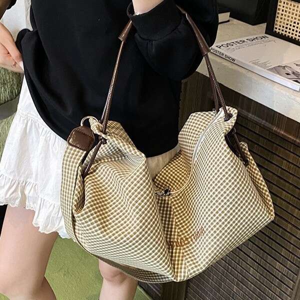 Bags Designer Women Korean Large Capacity Bucket for Women 2025 New Fashion Commuter Shoulder Versatile College Style Canvas Bag