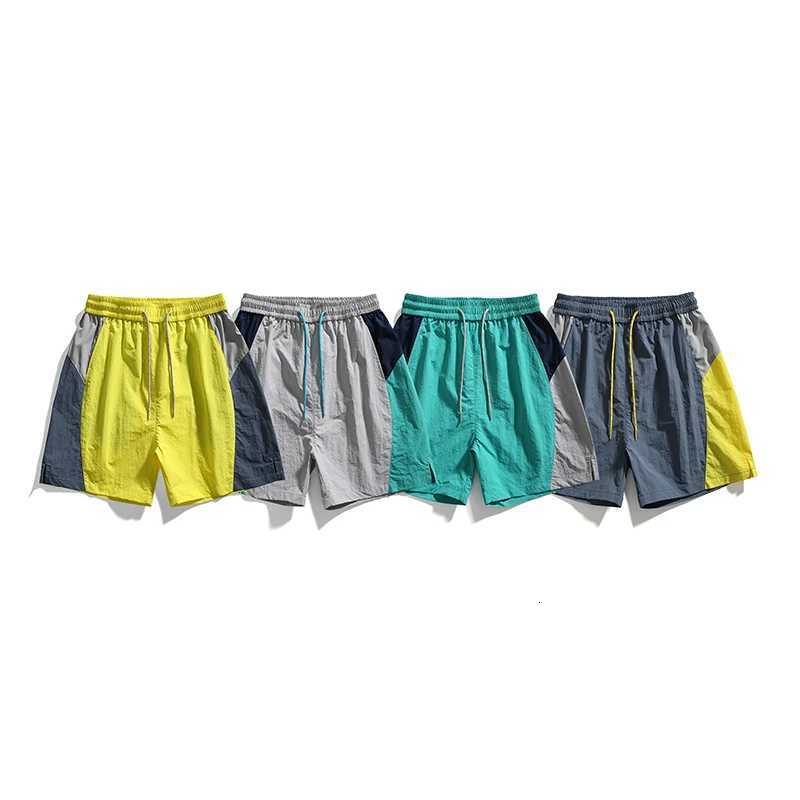 Sports running shorts mens trendy brand color blocking splicing drawstring elastic five quarter pants for men and women Y250814