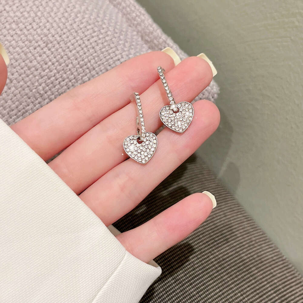DHcollections Korean Style Heart 2024 New Trend Niche Design High-end Light for Women Summer Temperament Stud Earrings