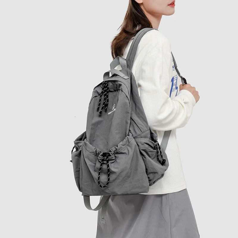 Nylon Solid Color Large Capacity Backpack Soft Versatile Bags Female High Quality Air Cushion Strap Soft Casual Backpack 250809