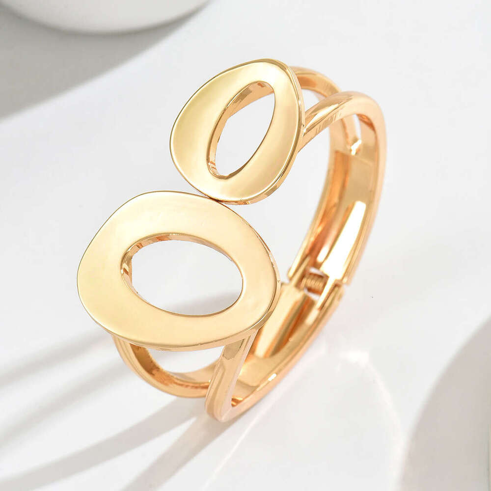 Feng Women's Geometric Niche Hollow Metal Smooth Design Asymmetric Open Bracelet Jewelry