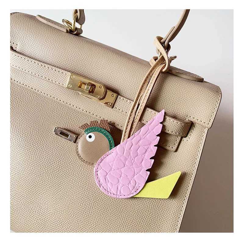 TOPHIGH Flying Bird Pendant For Wen Bag Cowhide Leather New Cartoon Designer Luxury Bags Keychain Newly Car hanging Charms S250816